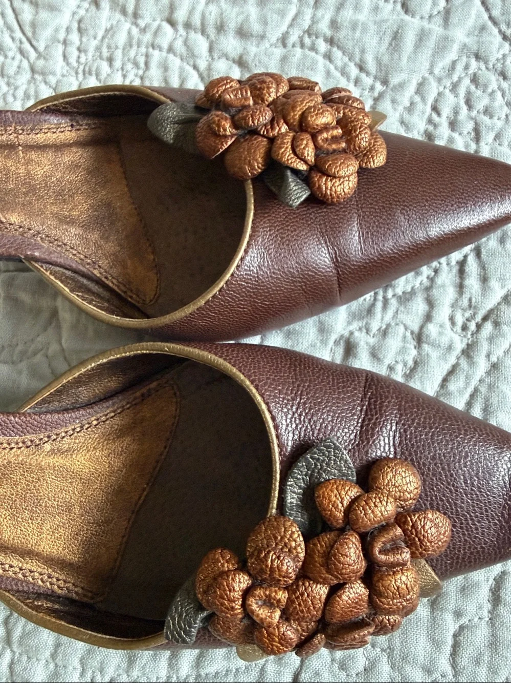 Unisa brown heels with 3D floral embellishments
